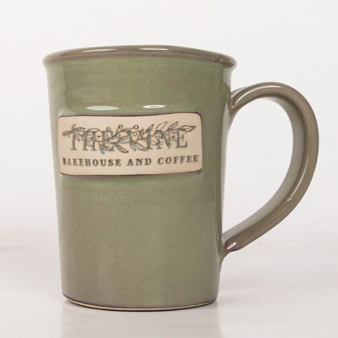 Olive glaze on a custom mug