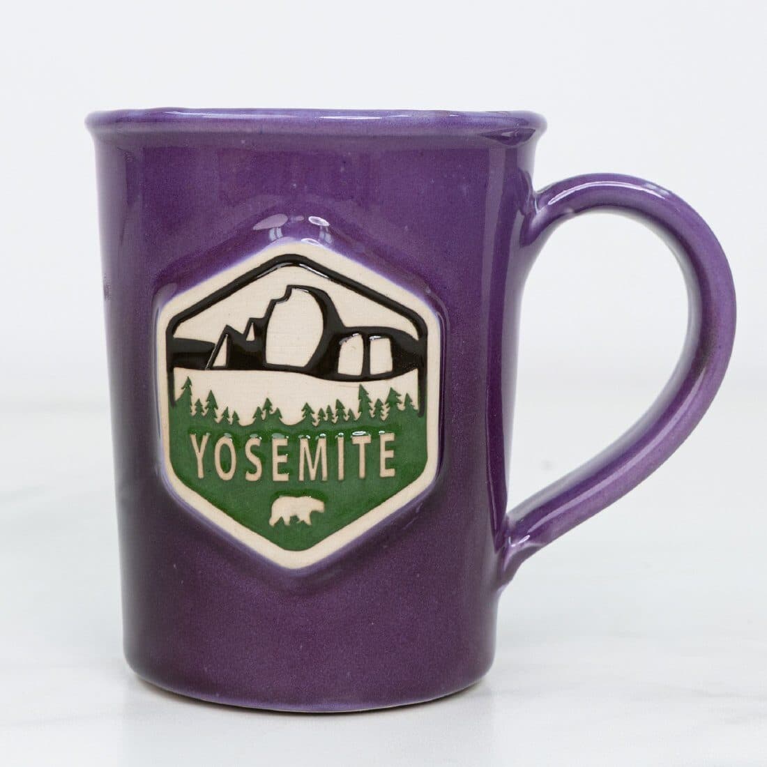 Violet glaze on a custom mug